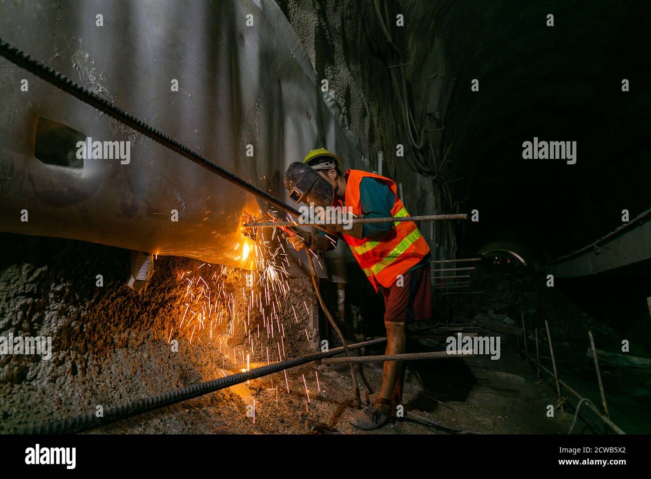 Vientiane, Laos. 28th Sep, 2020. A worker is busy at the construction site of the Xiang Ngeun No. 3 Tunnel in Luang Prabang Province, Laos, Sept. 28, 2020. Xiang Ngeun No. 3 Tunnel, the last tunnel along the China-Laos Railway, was drilled through on Tuesday. So far, all the 75 tunnels across the China-Laos Railway have been holed. The successful completion of the tunnels indicates that the controlling factors affecting the China-Laos railway project have basically been removed. Credit: Kaikeo Saiyasane/Xinhua/Alamy Live News Stock Photo