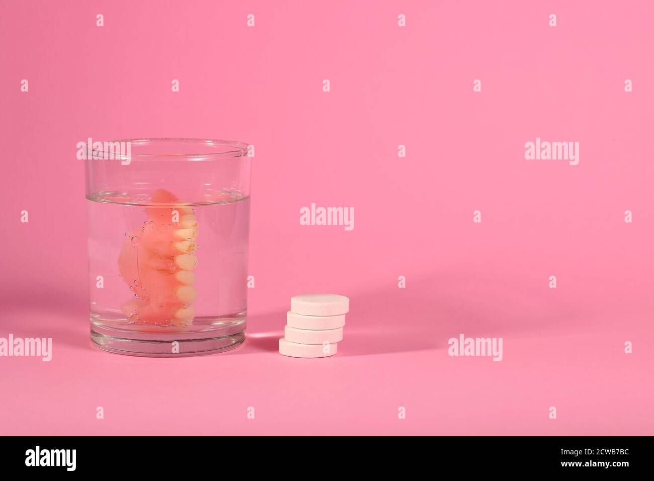 cleaning false teeth Stock Photo Alamy