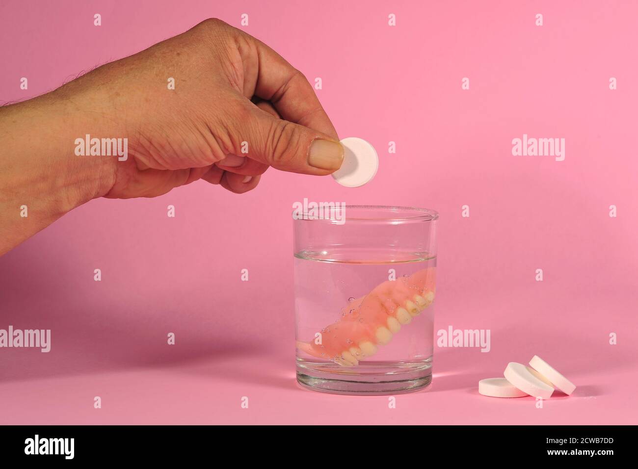 cleaning false teeth Stock Photo Alamy