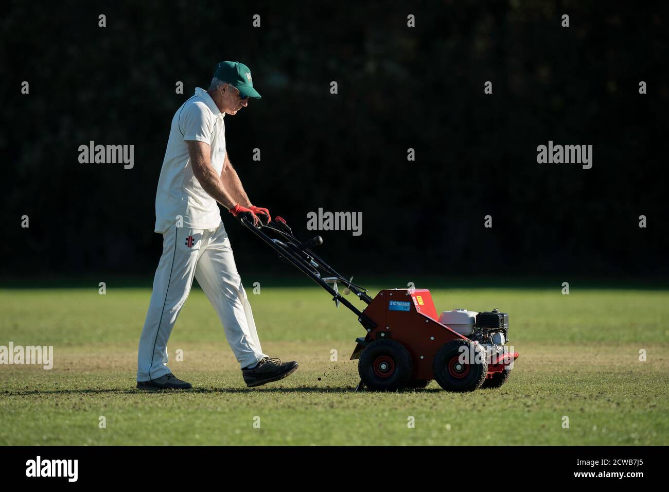 Scarifying pitch after last game of the season. Stock Photo