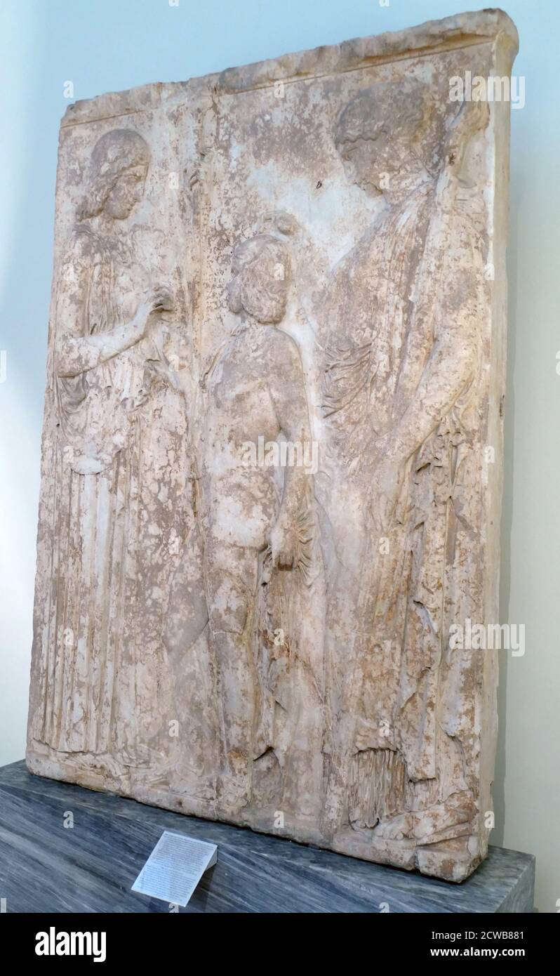 Votive relief made from pentelic marble found in Eleusis. Stock Photo