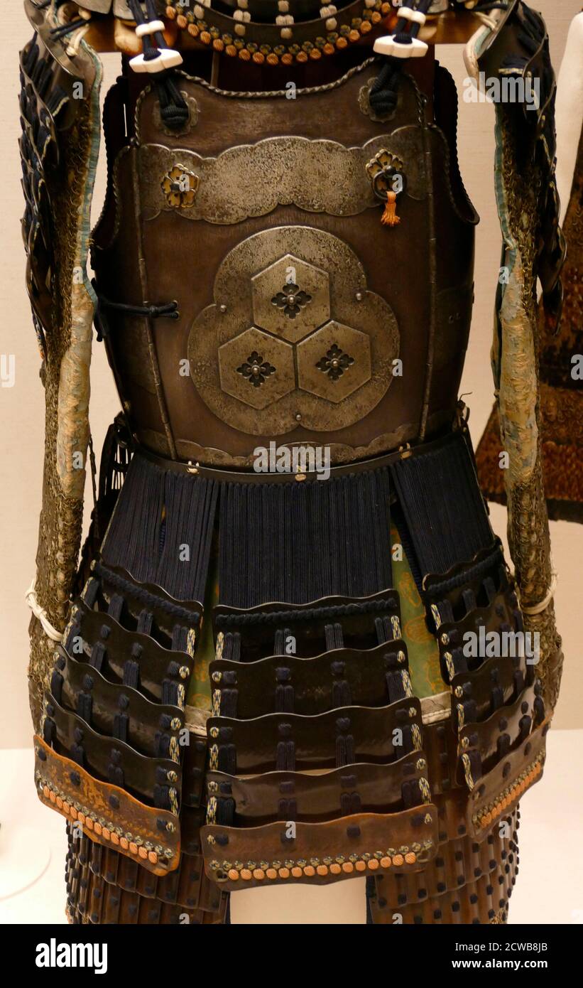 Samurai armour and helmet. Samurai were the hereditary military nobility and officer caste of medieval and early-modern Japan from the 12th century to their abolition in the 1870s. Stock Photo