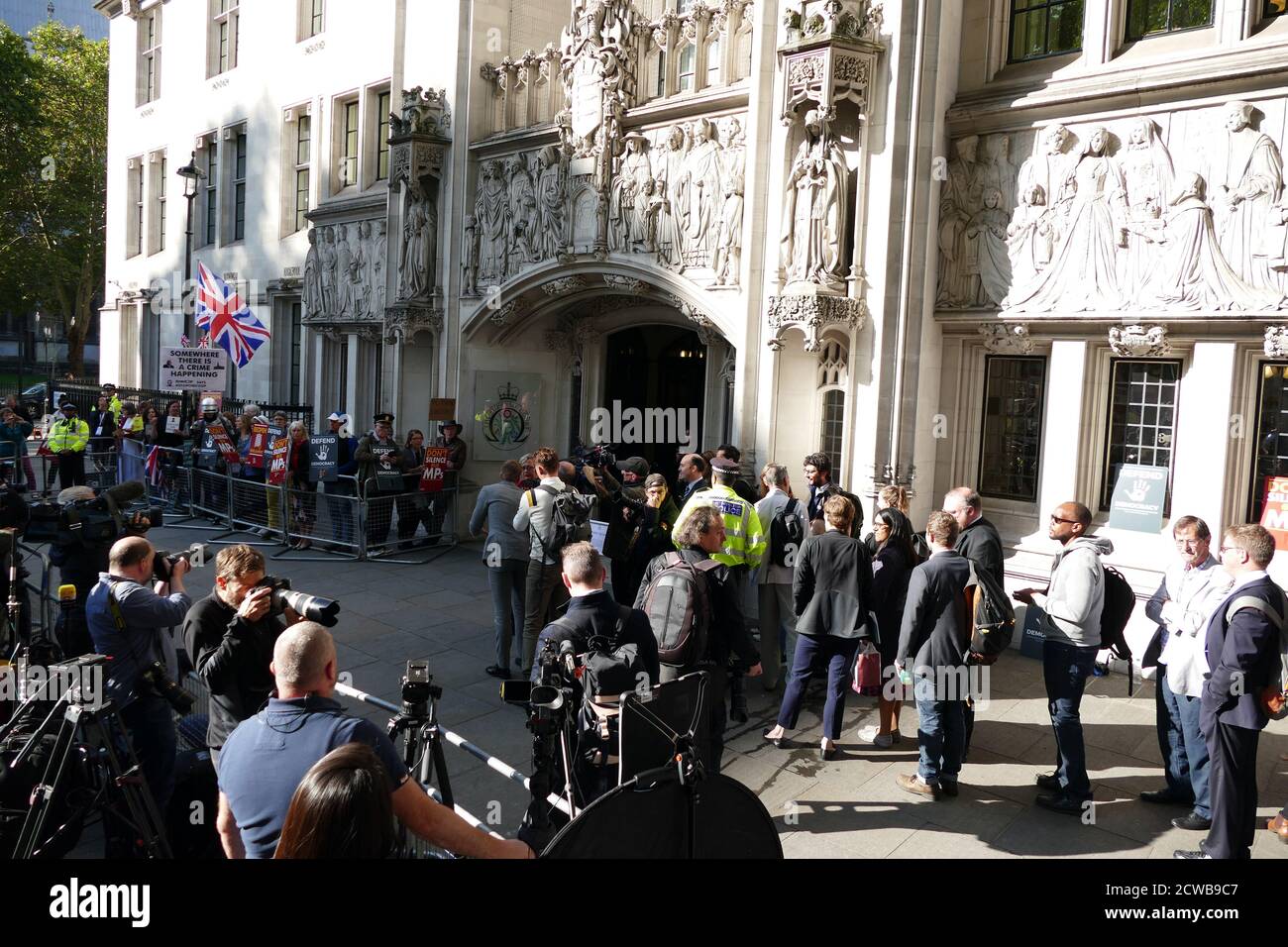 Remain' supporters at the Supreme Court, on the first day of the hearing on the Prorogation of Parliament. 17th Sept 2019. prorogation of the Parliament of the United Kingdom was ordered by Queen Elizabeth II upon the advice of the Conservative Prime Minister, Boris Johnson, on 28 August 2019. opposition politicians saw this as an unconstitutional attempt to reduce parliamentary scrutiny of the Government's Brexit plan. A decision that the prorogation was unlawful was made by the Supreme Court of the United Kingdom on 24th September 2019. Stock Photo
