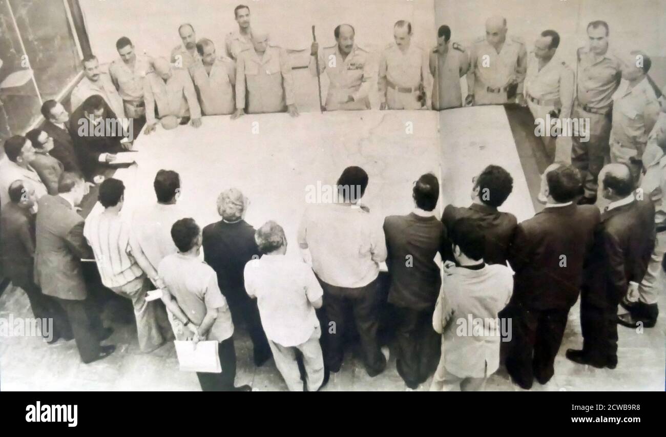 Photograph of President Sadat briefing military correspondents and newspaper editors before the beginning of the October War Stock Photo