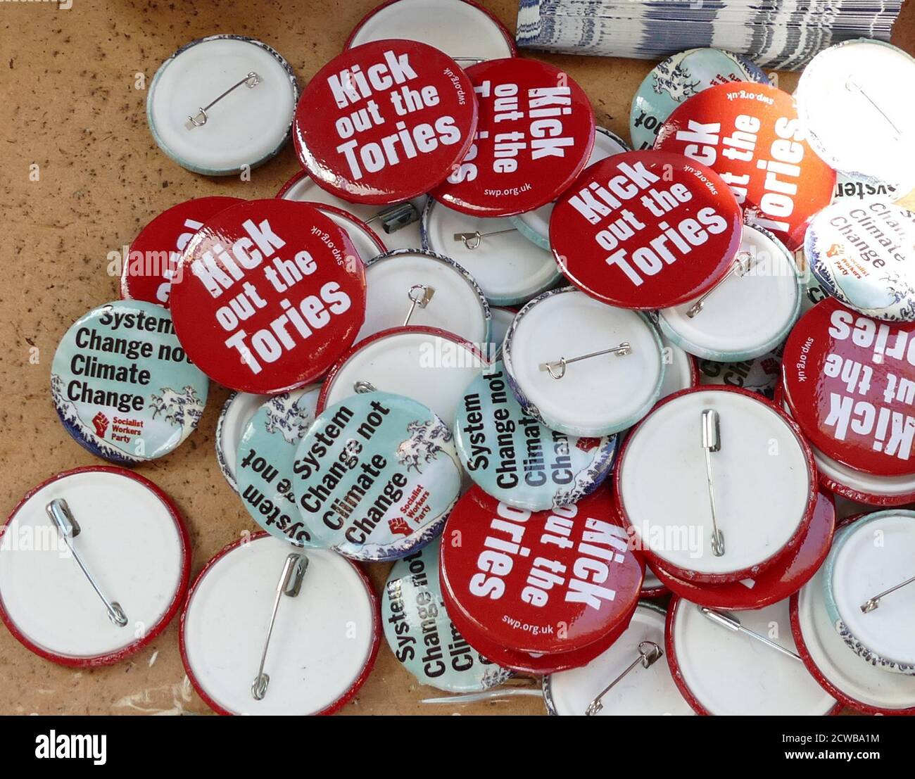 Socialist Workers Party badges, London, during the 20th September 2019 climate strike. Also known as the Global Week for Future, a series of international strikes and protests to demand action be taken to address climate change. The 20 September protests were likely the largest climate strikes in world history. Organisers reported that over 4 million people participated in strikes worldwide, including 300000 people joined UK protests Stock Photo