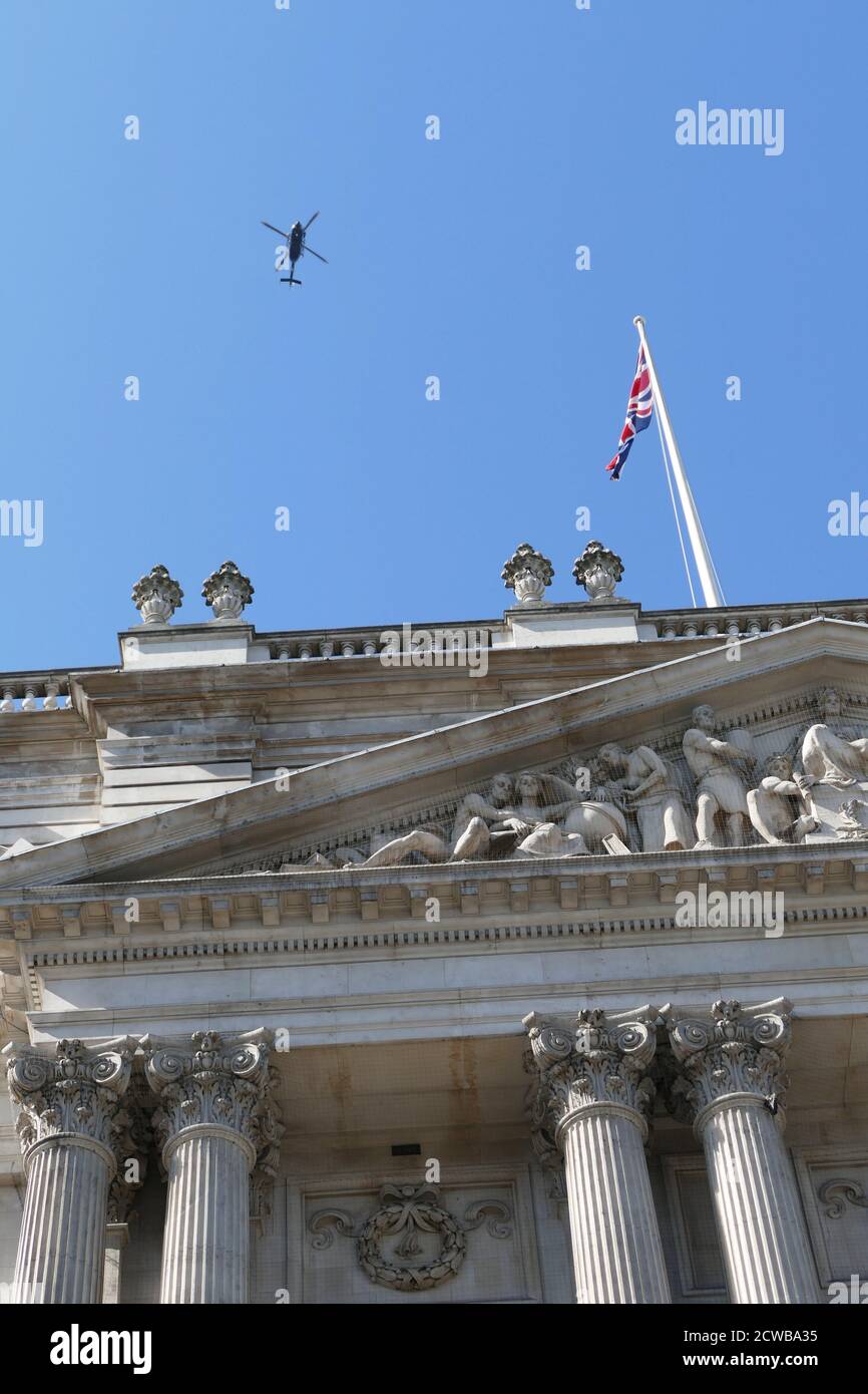 Police helicopter above Whitehall, London, during the 20th September 2019 climate strike. Also known as the Global Week for Future, a series of international strikes and protests to demand action be taken to address climate change. The 20 September protests were likely the largest climate strikes in world history. Organisers reported that over 4 million people participated in strikes worldwide, including 300000 people joined UK protests Stock Photo
