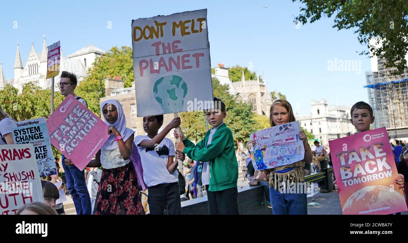 children join the 20th September 2019 climate strike in London. Also known as the Global Week for Future, a series of international strikes and protests to demand action be taken to address climate change. The 20 September protests were likely the largest climate strikes in world history. Organisers reported that over 4 million people participated in strikes worldwide, including 300000 people joined UK protests Stock Photo
