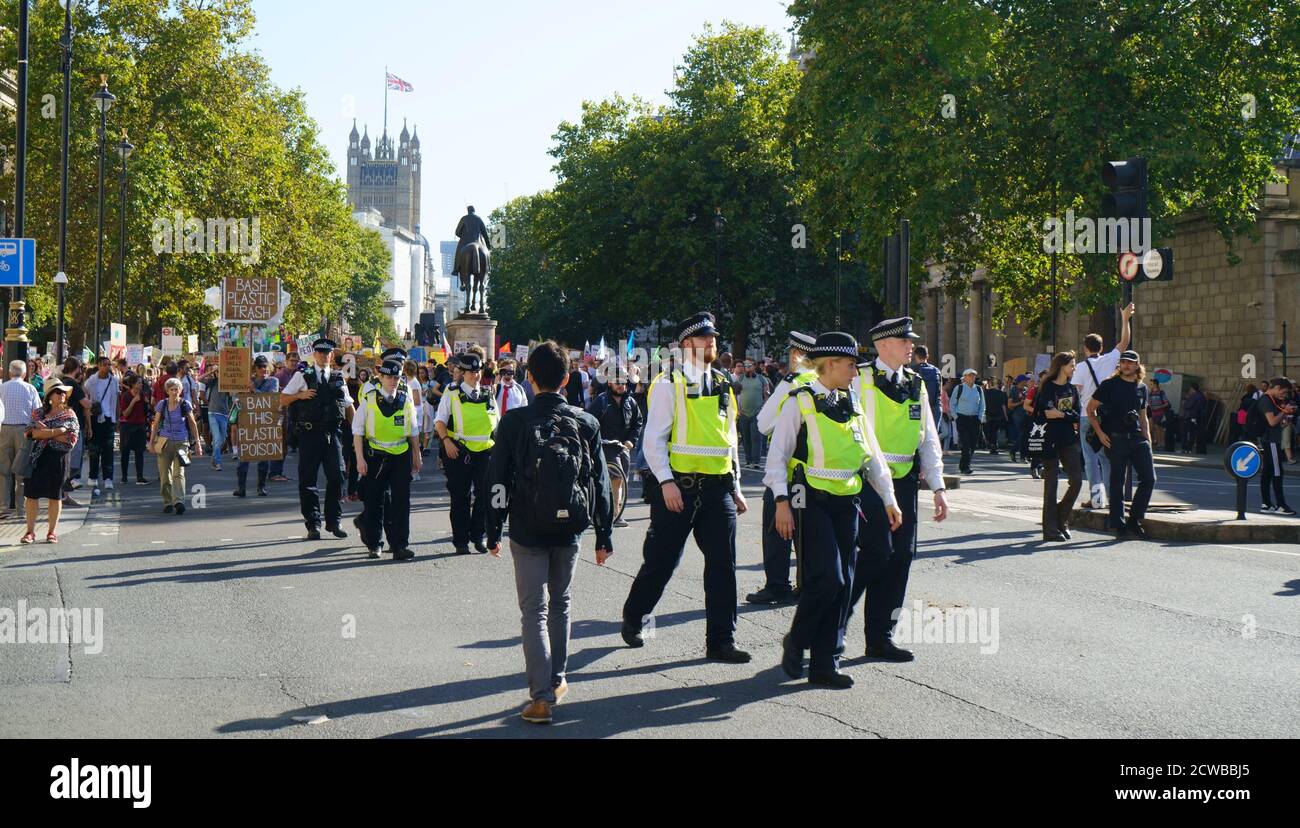 Policing during the Climate emergency demonstration in London, 26th September 2019. The September 2019 climate strikes, (Global Week for Future), were a series of international strikes and protests to demand action be taken to address climate change. The strikes took place from 20-27 September. The protests took place across 4,500 locations in 150 countries. Stock Photo