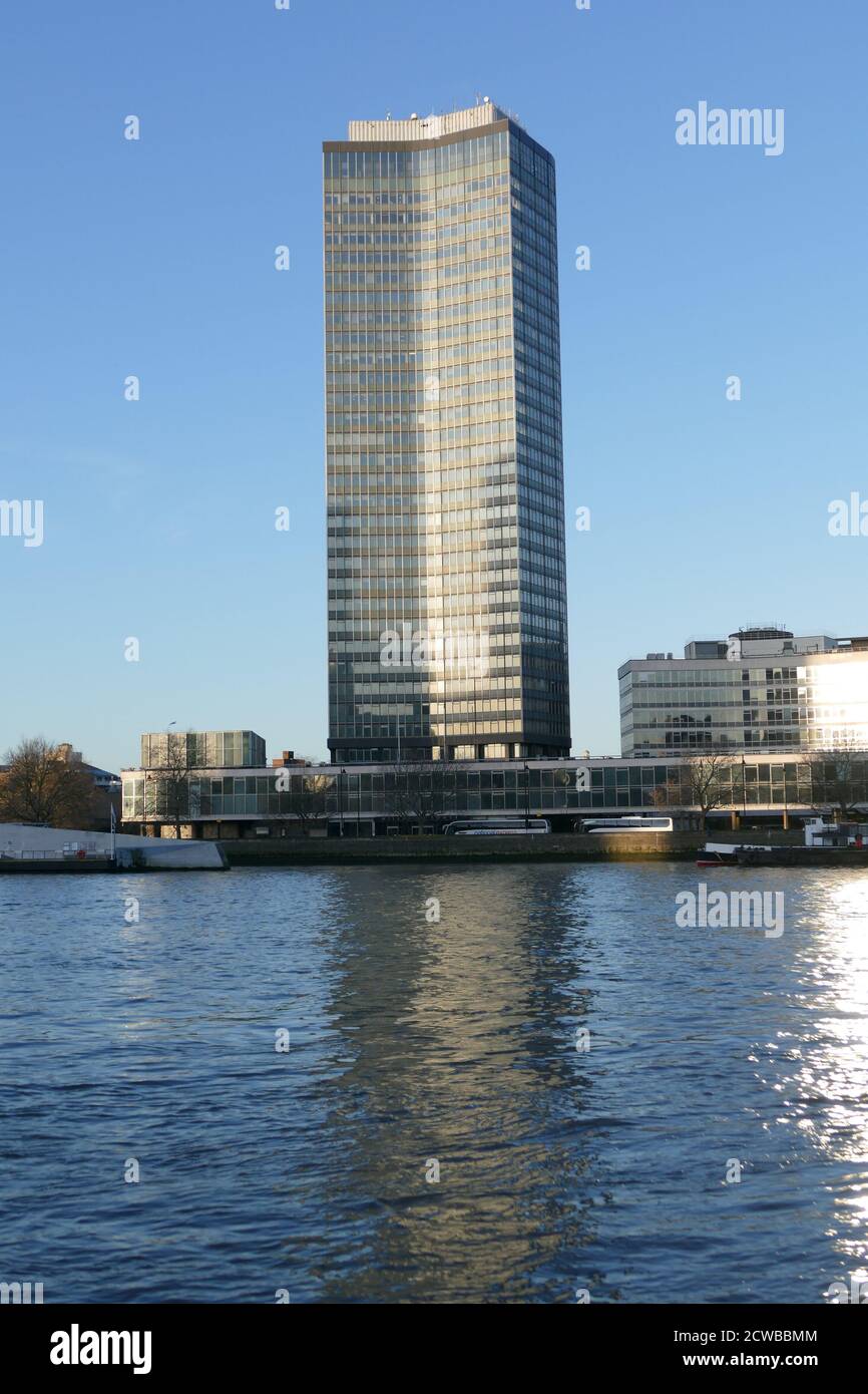 Millbank Tower is a 118-metre (387 ft) high skyscraper in the City of Westminster at Millbank, by the River Thames in London. The tower was constructed in 1963, and has been home to many high-profile political organisations, including the Labour and Conservative parties, and the United Nations Stock Photo