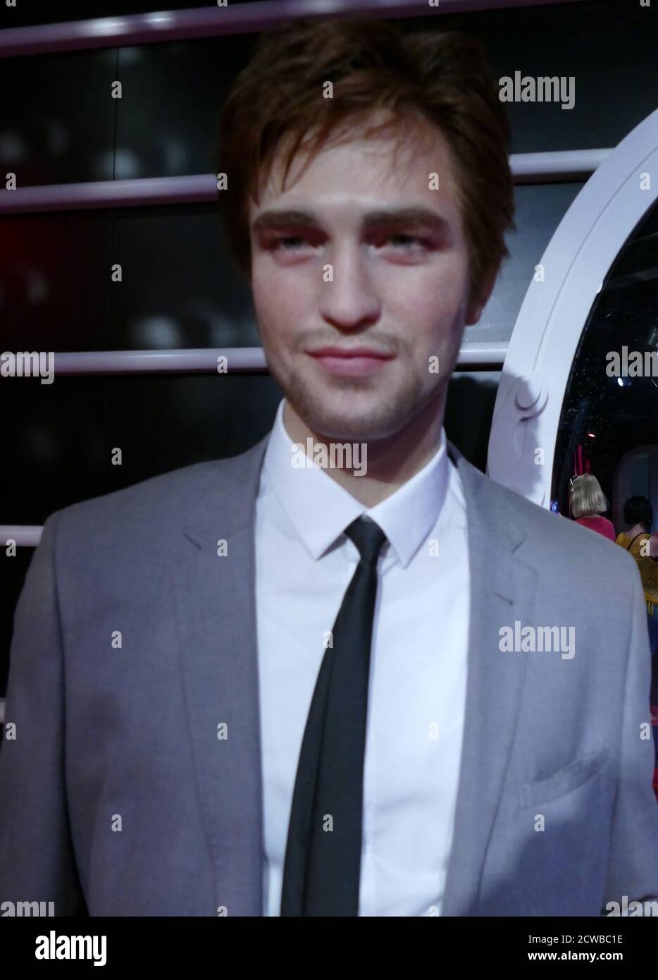 Waxwork depicting Robert Pattinson (born 13 May 1986); English actor. After starting to act in a London theatre club at the age of 15, he began his film career at age 18 by playing Cedric Diggory in the fantasy film Harry Potter and the Goblet of Fire (2005). He went on to star as Edward Cullen in the film adaptations of the Twilight novels, consisting of five films between 2008 and 2012 Stock Photo