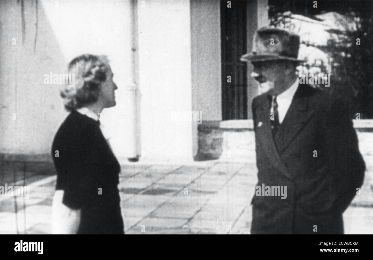 Adolf Hitler and Eva Braun, Berchtesgaden, Bavaria, Germany, c1936-1945. Eva Braun came to live with Hitler at the Berghof at his home in the Bavarian Alps in 1936. They were married in his bunker in Berlin on 29 April 1945 in the closing days of World War II before committing suicide the following day. The photographer is unknown. Stock Photo