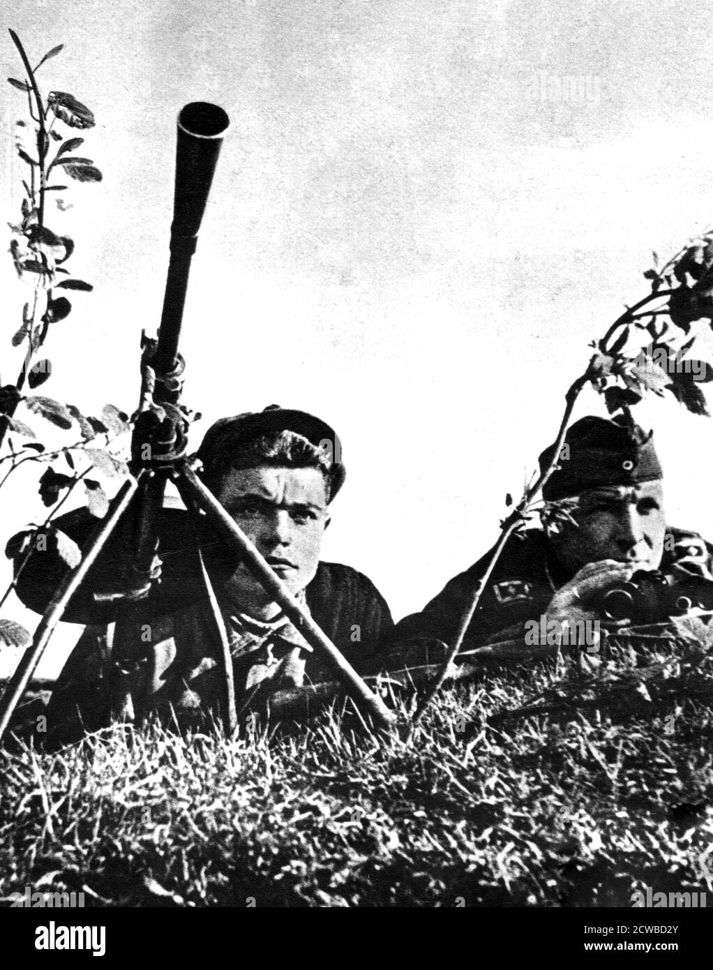 Ukrainian serving with the German army, Russian Front, 1941-1944. Detail from a German propaganda poster. When the Germans invaded the Soviet Union in 1941, many Ukrainians welcomed them as liberators. Western Ukraine was occupied by the Soviets in 1939. Under German occupation, Ukrainian nationalist partisans fought on both sides. The photographer is unknown. Stock Photo