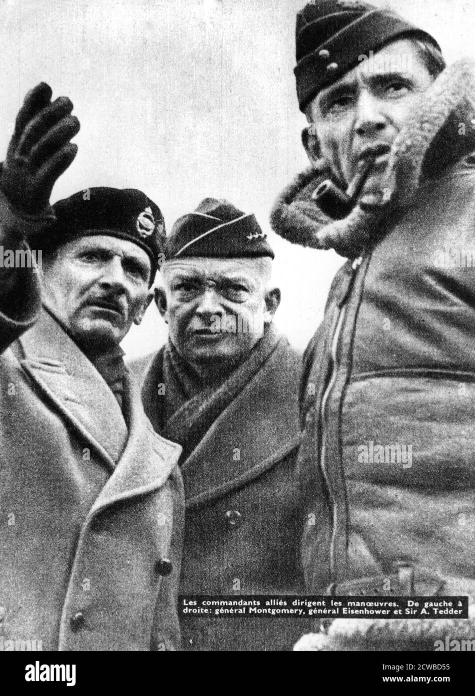 Allied commanders in France, 1944. From left to right; Field Marshal Bernard Montgomery, General Dwight D Eisenhower, Air Marshal Sir Arthur Tedder. The photographer is unknown. Stock Photo