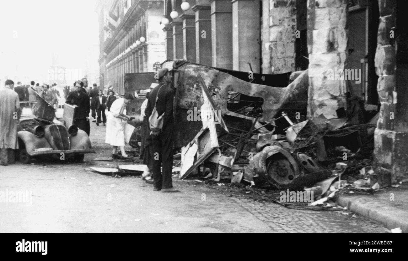 Destoyed vehicle, Rue de Castiglione, liberation of Paris, August 1944. After just over four years of occupation, the Germans surrendered the city to the French 2nd Armoured Division on 25 August 1944. The previous week the French Resistance and elements of the general population rose up in revolt against their occupiers. The photographer is unknown. Stock Photo
