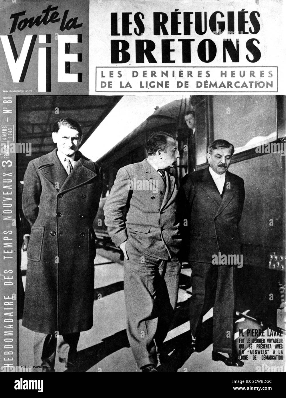 End of the line of demarcation between German-occupied and Vichy France, November 1942 (March 1943). Cover of a French magazine. After the Allies landed in North Africa in Operation Torch the Germans occupied the part of France governed by the Vichy regime under the terms of the armistice agreed in 1940. Pierre Laval (right) was the last traveller to present himself with a pass at the line of demarcation before its abolition. The photographer is unknown. Rights information: Cleared for Editorial Use Only. Please Contact Us For Any Other Clearance Rights. Stock Photo
