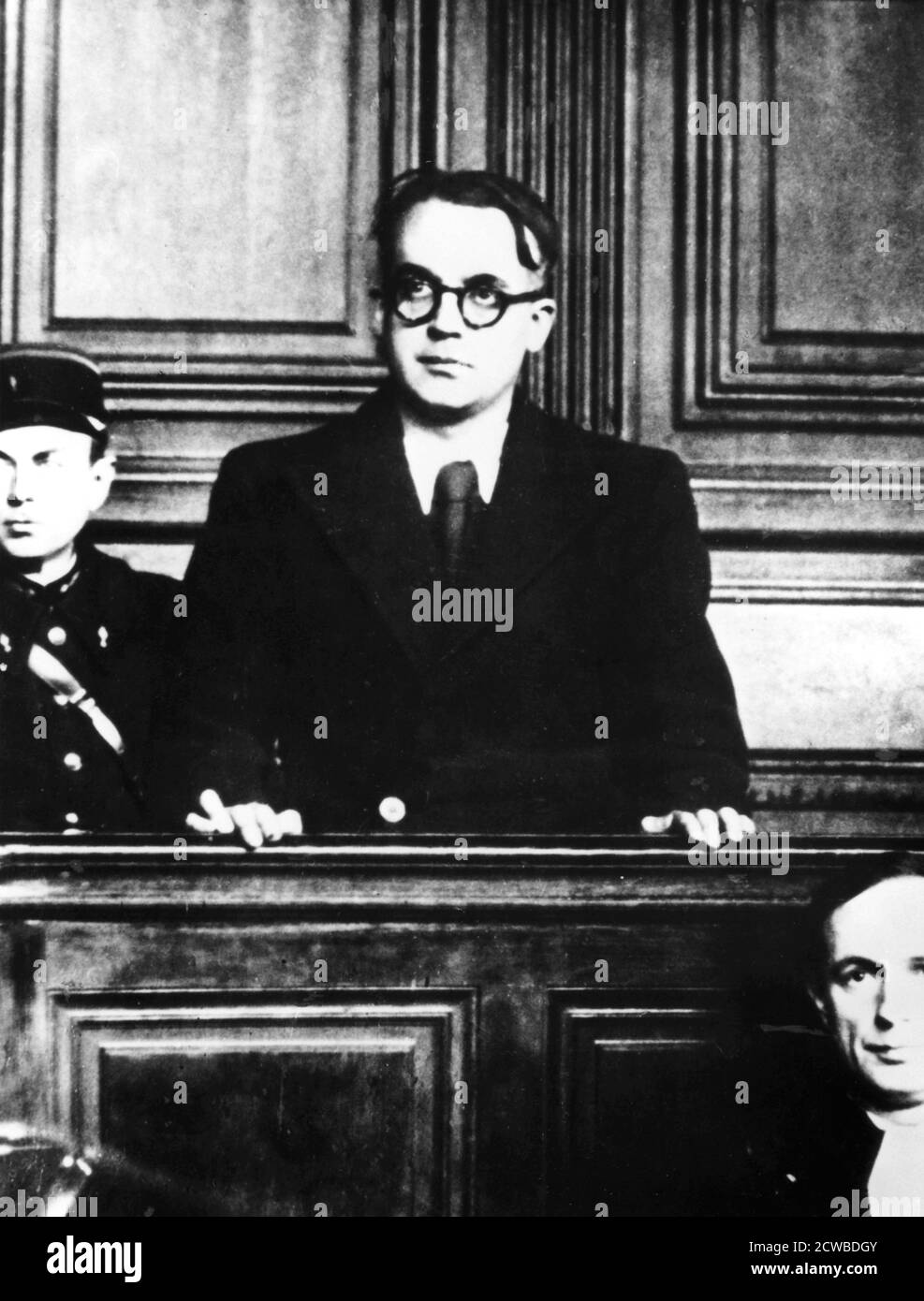 Trial of the French pro-Nazi author Robert Brasillach, Paris, 1945. A supporter of fascism since 1934, Brasillach edited an anti-semitic newspaper, Je suis partout, during the Nazi occupation of France. He also supported the German occupation of Vichy France and signed a 1944 document calling for the summary execution of all French Resistance members. Arrested after Paris fell to the Allies, he was convicted of cooaboration and executed by firing squad on 6 February 1945. The photographer is unknown. Stock Photo