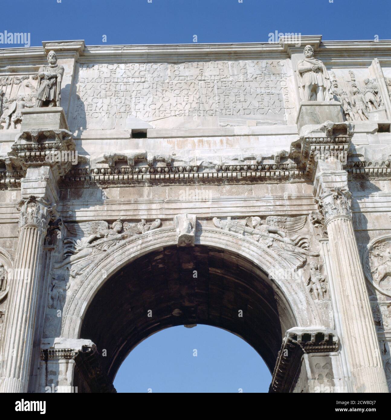 Arch of Constantine, Rome, 4th century. The Arch of Constantine is a triumphal arch in Rome, situated between the Colosseum and the Palatine Hill. It was erected to commemorate Constantine I's victory over Maxentius at the Battle of Milvian Bridge on October 28, 312. The artist is unknown. Stock Photo