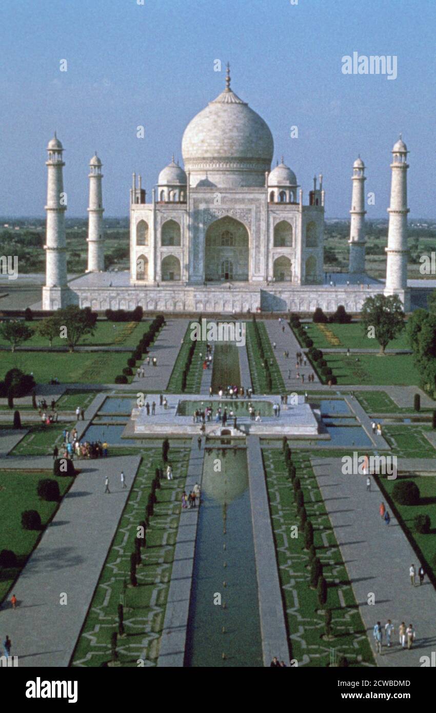 The Taj Mahal, from the top of the entrance gate, Agra, India. The great marble mausoleum built by Shah Jahan (1592-1666), Mughal emperor, for his wife Arjumand Banu Begam (d1631) called Mumtaz Mahal (Favourite of the Palace). The artist is unknown. Stock Photo