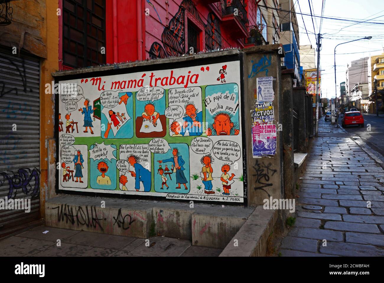Mural showing support for mothers who are single parents on wall next to headquarters of the women's rights group Mujeres Creando, La Paz, Bolivia Stock Photo