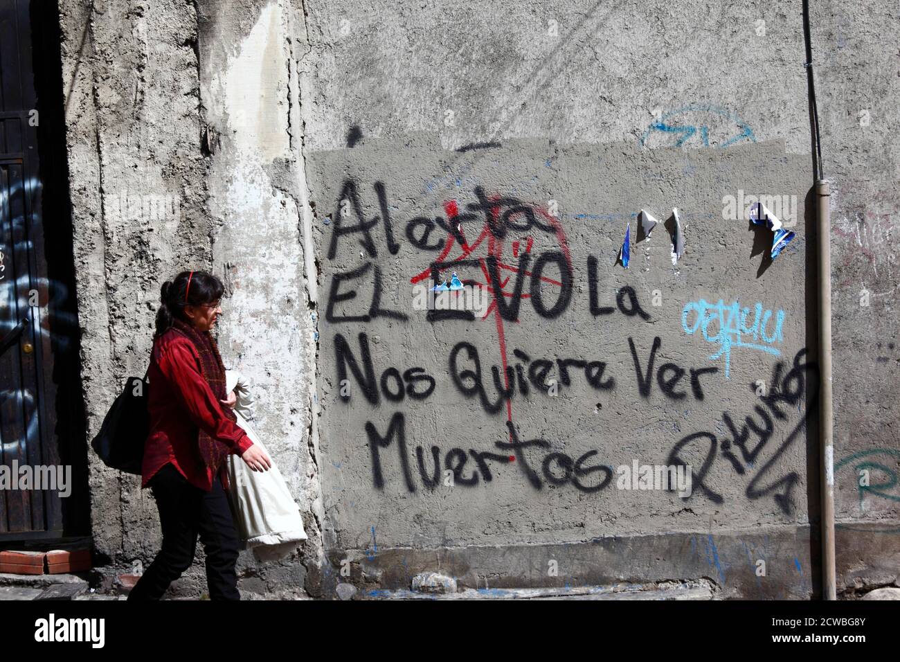 Graffiti on a wall warning of the dangers of Ebola and also, in a play on words, protesting against Bolivian president Evo Morales, La Paz, Bolivia Stock Photo