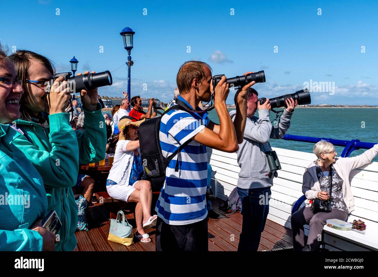 Photographers Take Photos Of An Aircraft Display During The Eastbourne Airshow, Eastbourne, East Sussex, UK Stock Photo