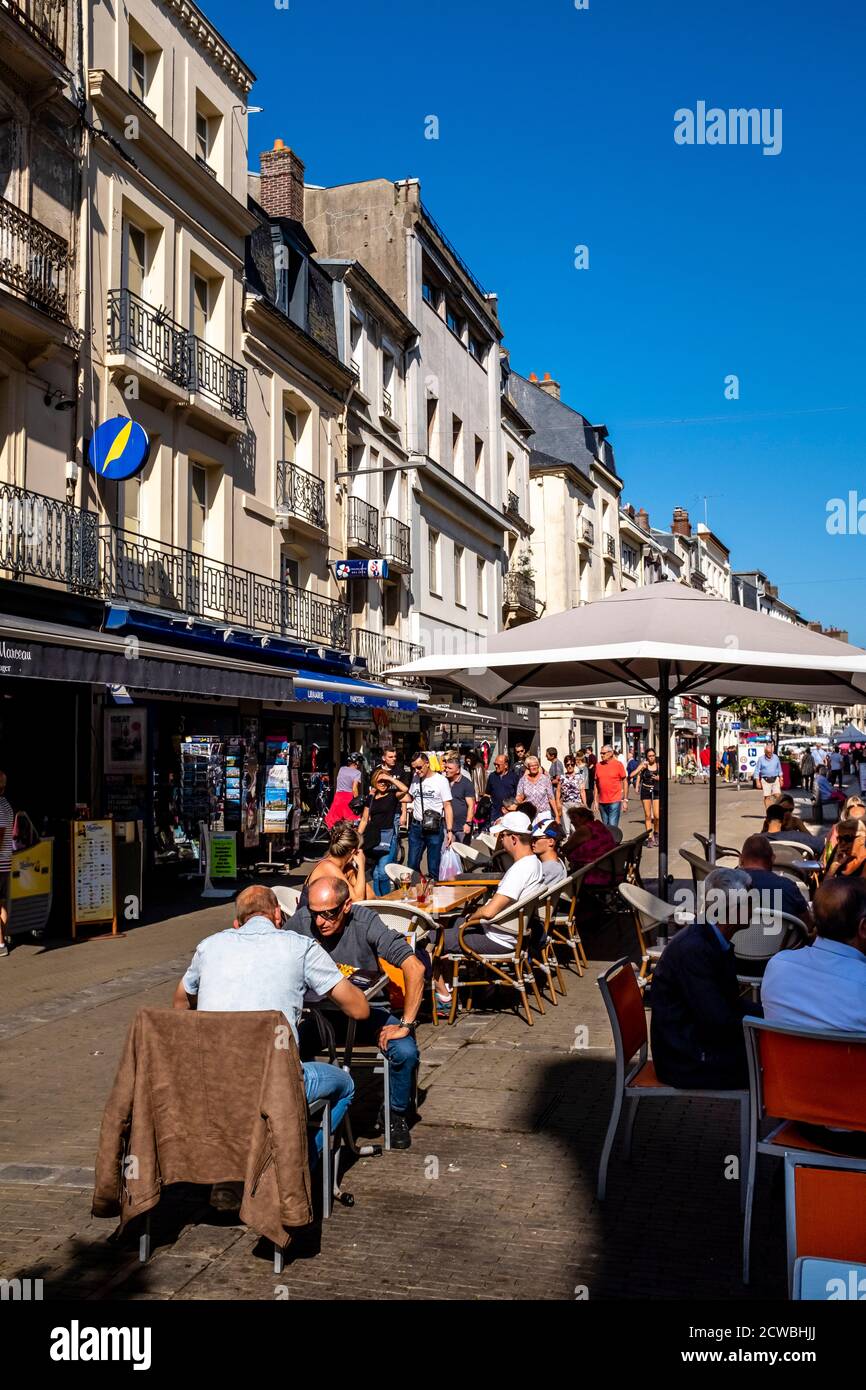Local People Sitting At A Street Cafe In The Town Of Dieppe, Normandy, France. Stock Photo
