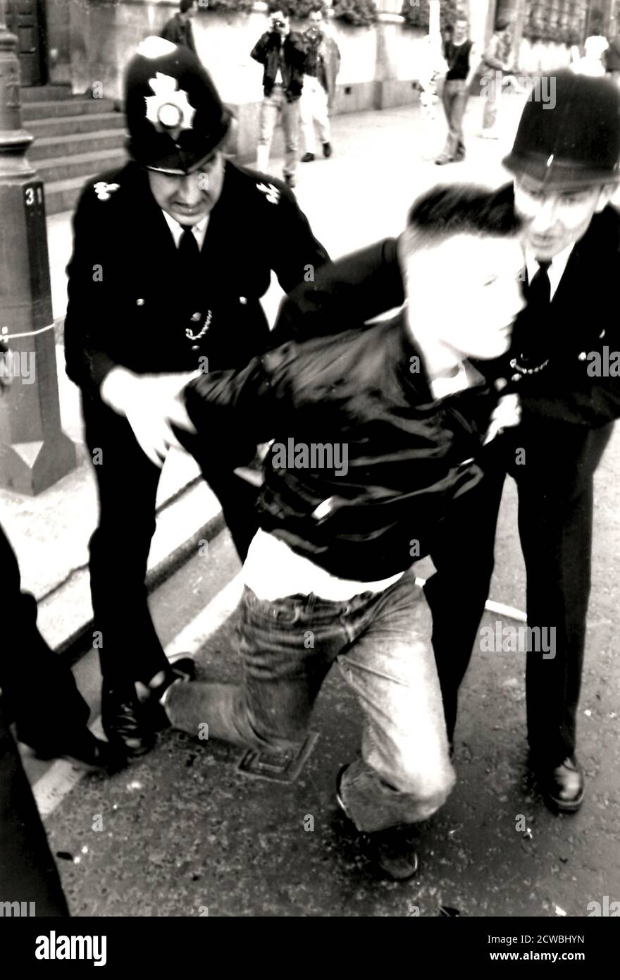 Photographs taken during the Poll Tax riots. The Poll Tax Riots were a series of riots in British towns and cities during protests against the Community Charge (poll tax), introduced by Prime Minister Margaret Thatcher. Stock Photo