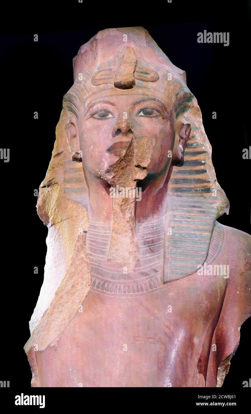 Colossal quartzite painted statue of King Tutankhamun later usurped by King Ay and King Horemheb. Reign of Tutankhamen 1326 BC Stock Photo