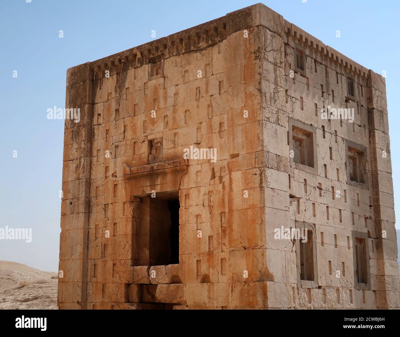 Photograph taken of Ka'ba-ye Zartosht, a stone structure in the Naqsh-e Rustam compound, in Fars, Iran. Stock Photo
