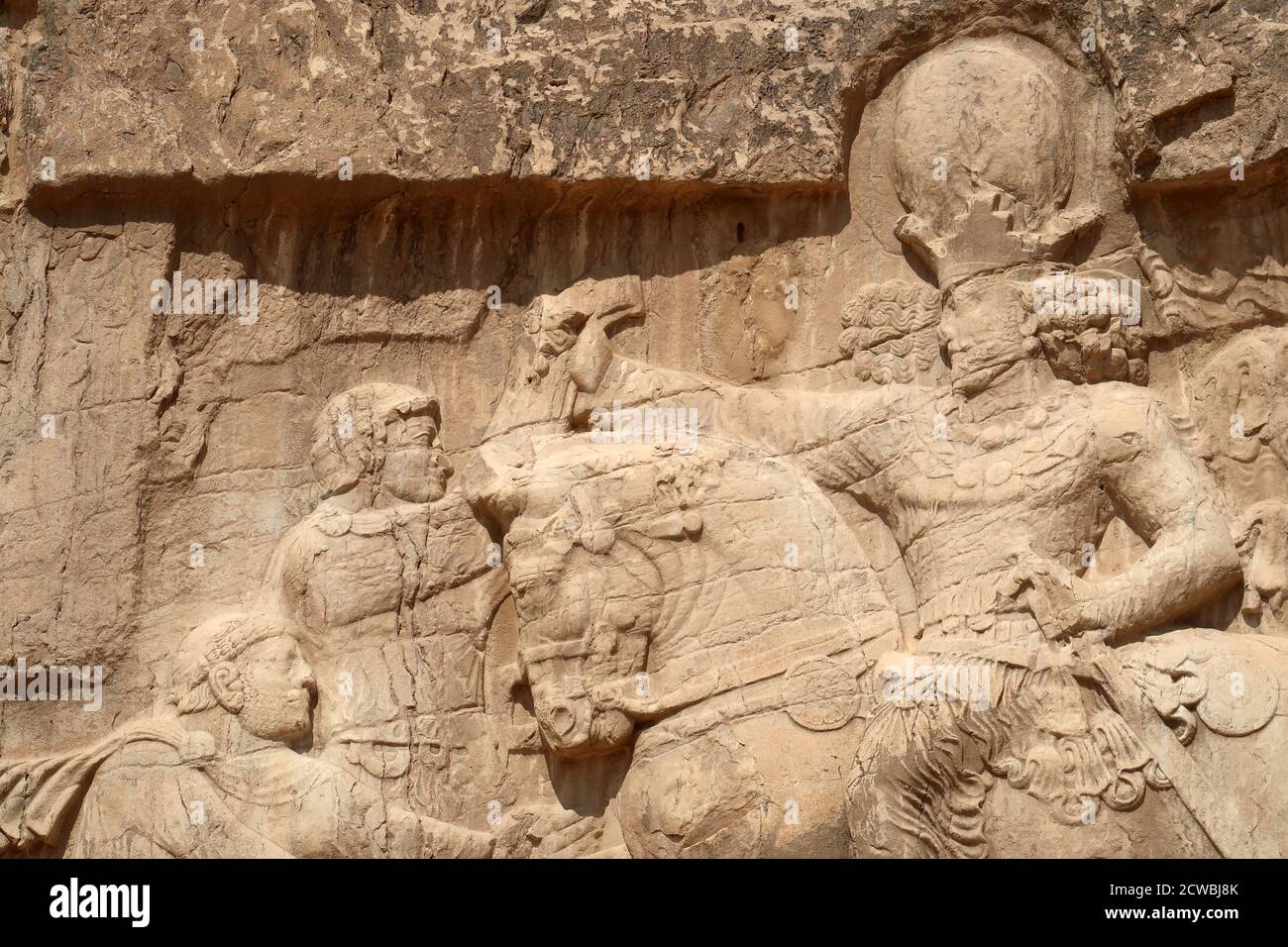 Photograph taken of the triumph relief of Shapur I, the most famous Sasanian rock relief at Naqsh-e Rostam. Stock Photo