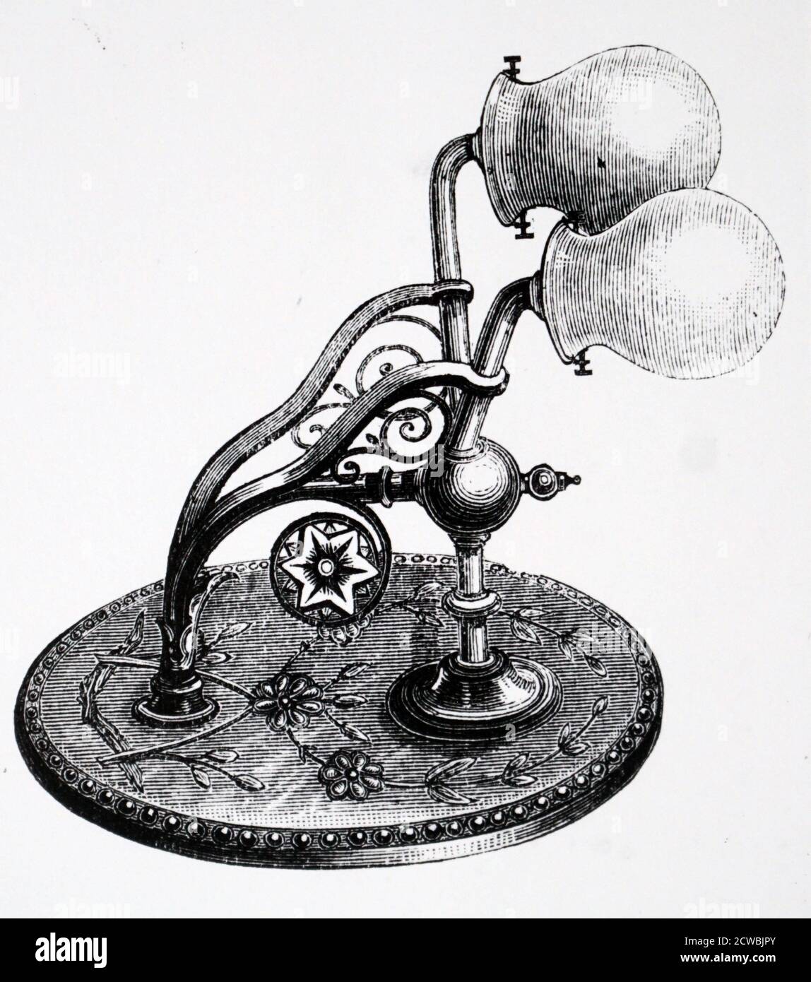 Engraving depicting a double bracket electric lamp holder for incandescent globes of the design fitted in the hall of an author's home in Highgate, London. Stock Photo