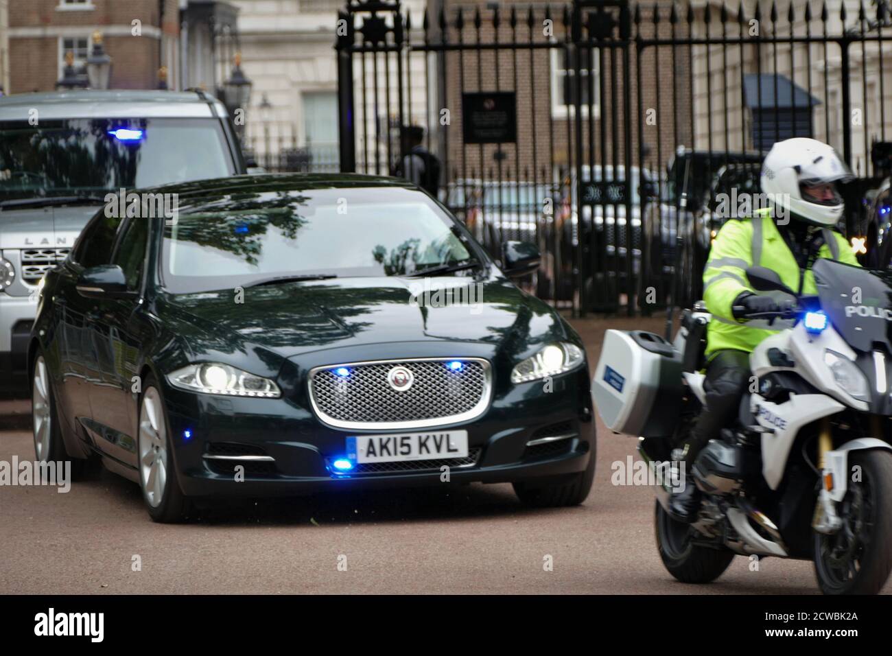 Photograph of the armed police security at St James' Palace for a departing minister after meeting US President Donald Trump, during his visit to London. June 2019 Stock Photo