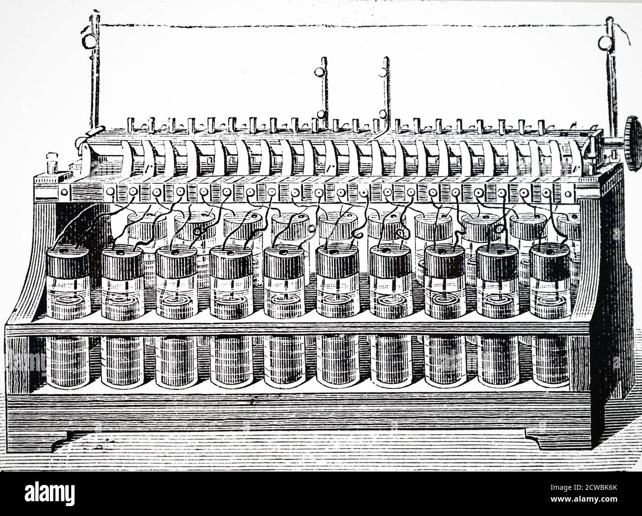 Engraving depicting a secondary battery. Battery of Plante cells (accumulators) of 20 elements. The Plante cell (1860) was 2 spiral lead plates immersed in diluted sulphuric acid. Stock Photo