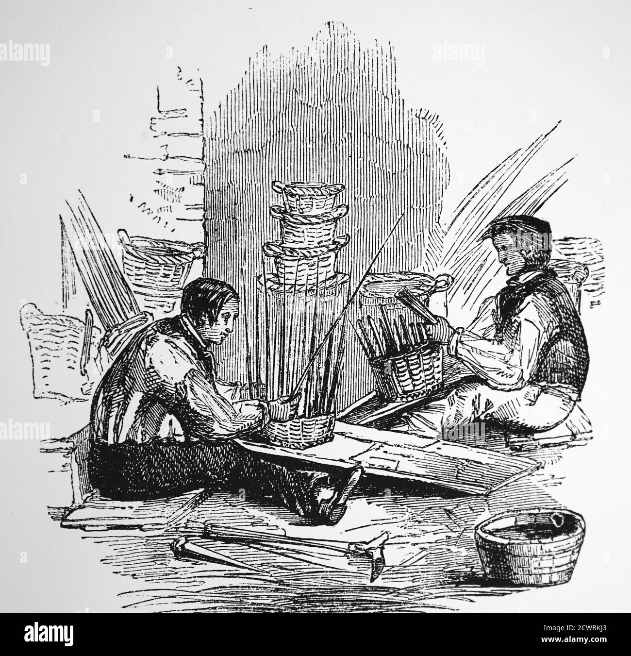 Engraving depicting basket makers weaving osiers. Stock Photo