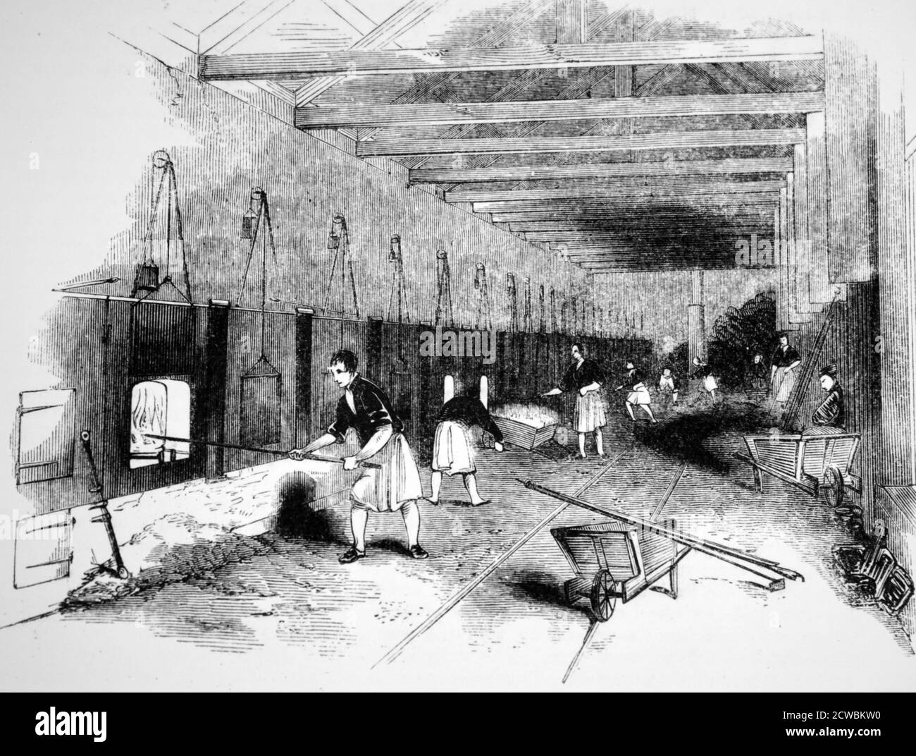 Engraving depicting the production of sodium carbonate. Sodium sulphate is mixed with lime and coal, heated in furnaces to produce sodium carbonate: Felling Chemical Works, Newcastle. Stock Photo
