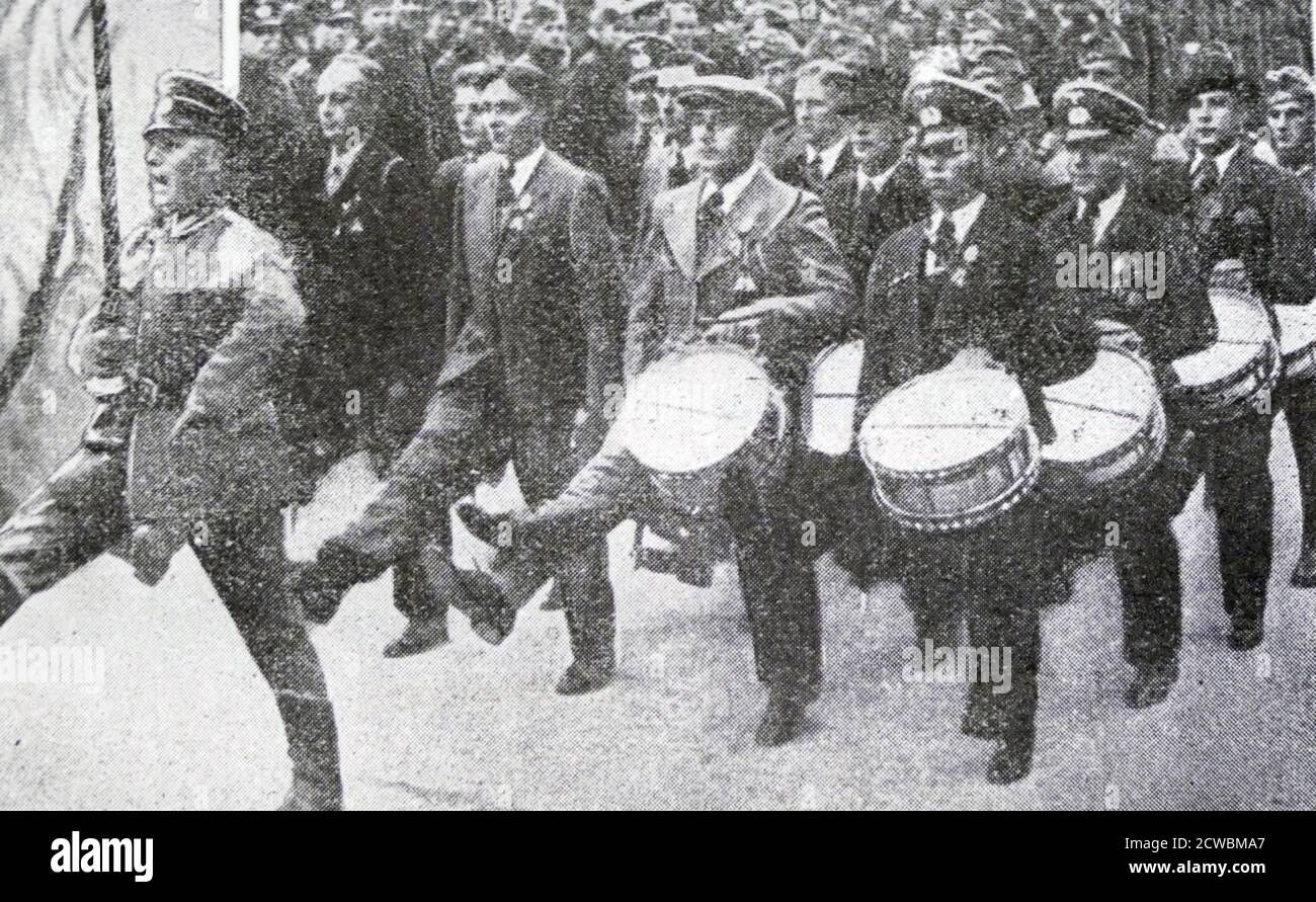 Black and white photo of the debut of the new German Army; the reestablishment of obligatory military service in Germany, 16 March 1935; young conscripts in a goose-step march. Stock Photo