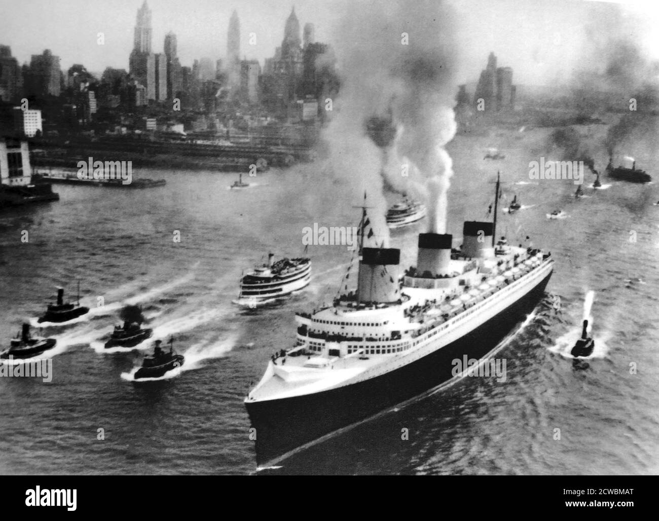 Black and white photo of the ship The Normandy arriving in New York, from the view of an airplane. Stock Photo