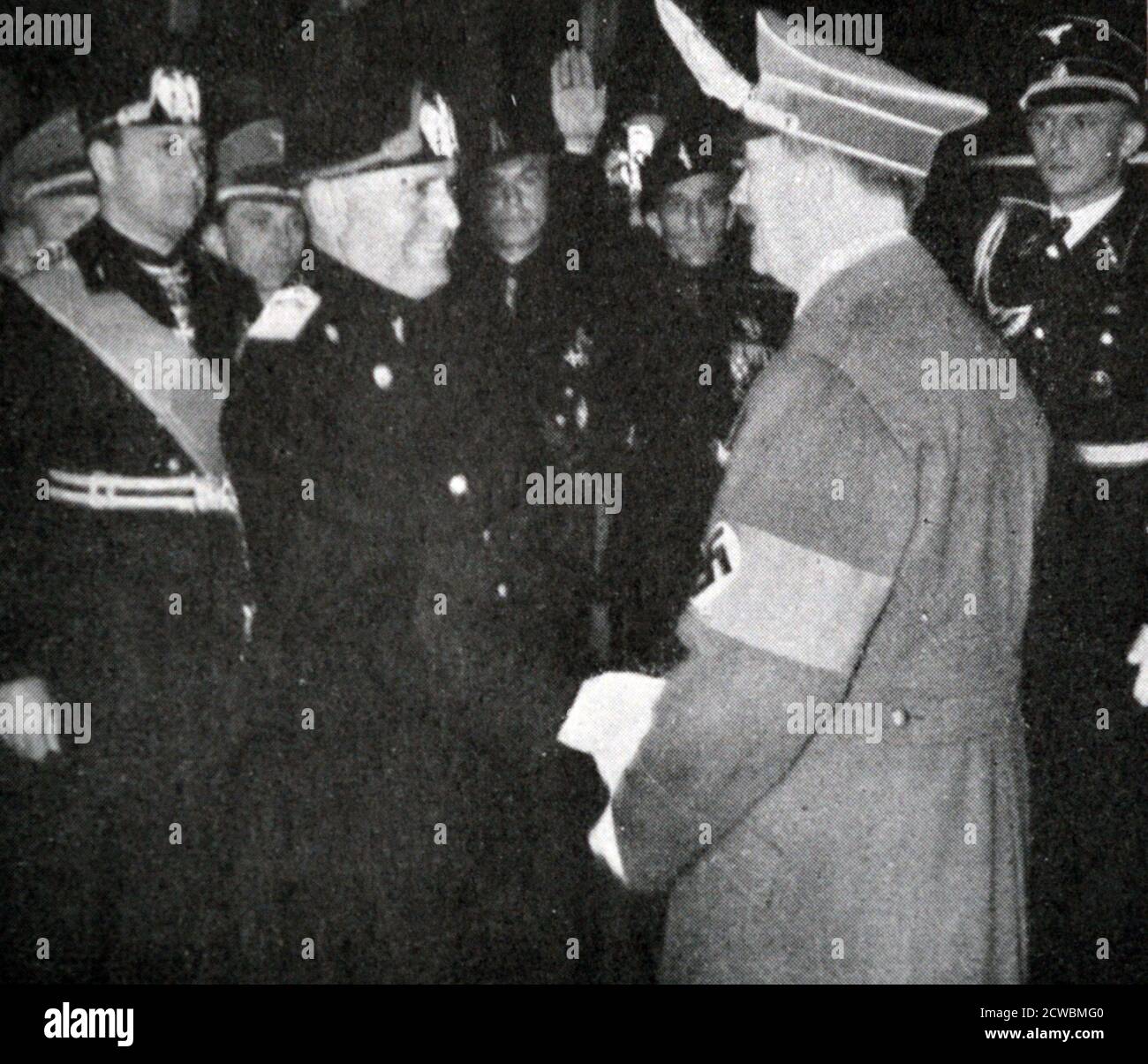 Black and white photograph of Adolf Hitler shaking hands with Benito Mussolini in Florence, May 1938. Stock Photo