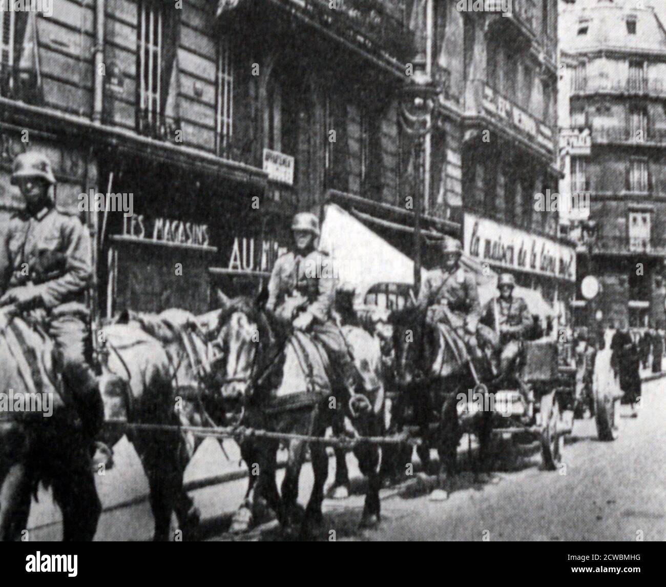 Black and white photograph of the Battle of France, May-June 1940; Refugees leave Paris during the German invasion Stock Photo