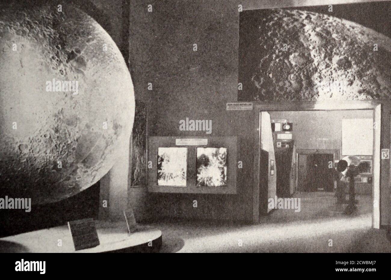 Black and white photograph pertaining to modern science; the 'Moon Room' at the Palais de la Decourverte, a museum of science and industry in Paris. Stock Photo