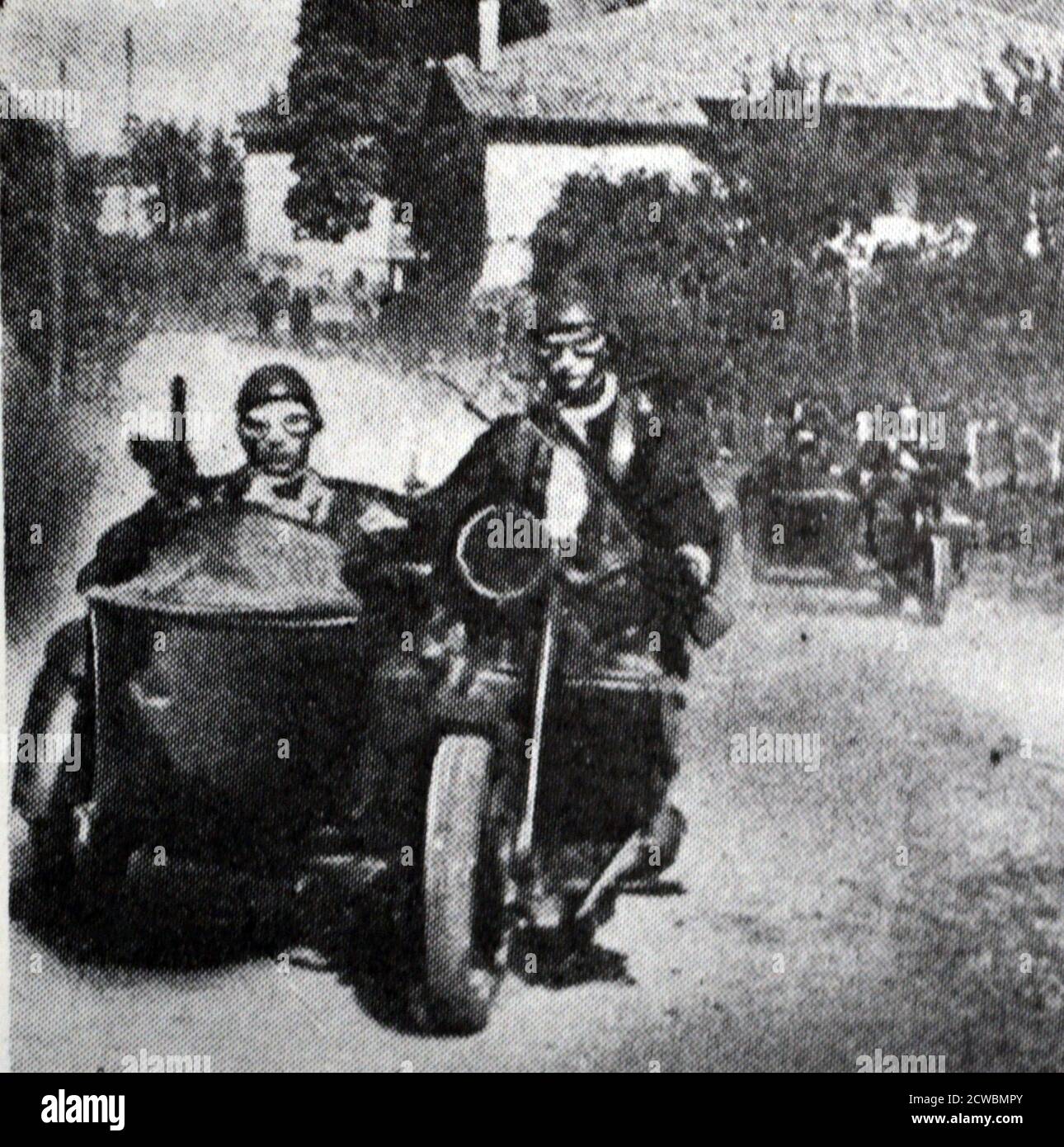 Black and white photograph of the Allies coming to save Belgium and the Netherlands; motorcycles coming from northern routes. Stock Photo