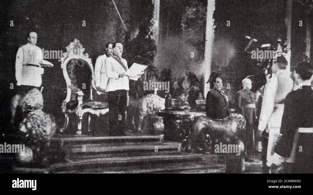 Black and white photograph of World War II (1939-1945); Spanish dictator Francisco Franco (1892-1975) delivering a speech in Madrid upon receiving membership to the Order of the German Eagle, instituted by Hitler in 1937 as an award for foreign diplomats who supported Nazi Germany. Stock Photo