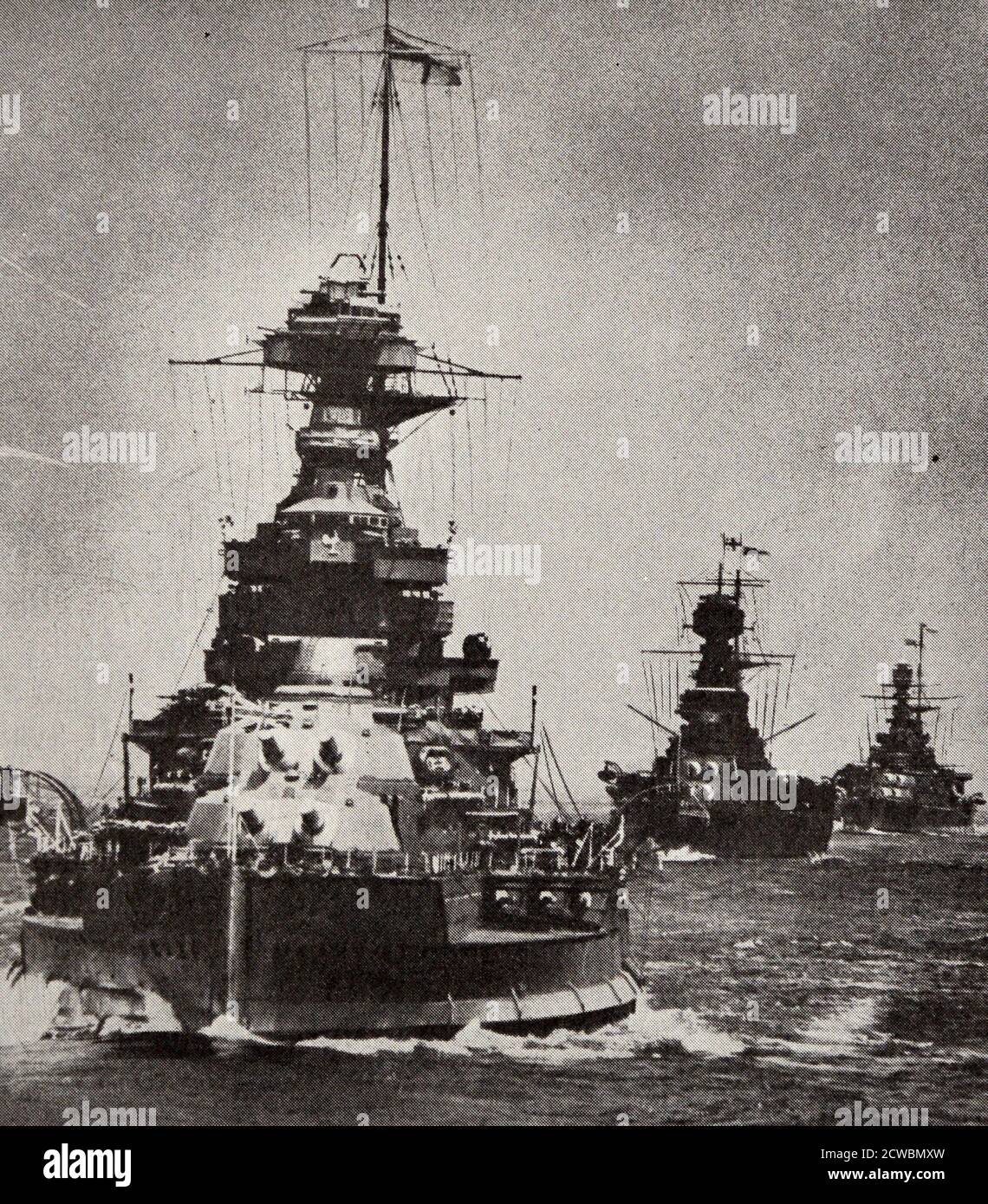 Black and white photograph of World War II (1939-1945); heavy ships from the Home Fleet of the British Navy, showing the 'Renown' and the 'Hood', considered the fastest ship in the British Navy which went into combat against the 'Bismarck'. Stock Photo
