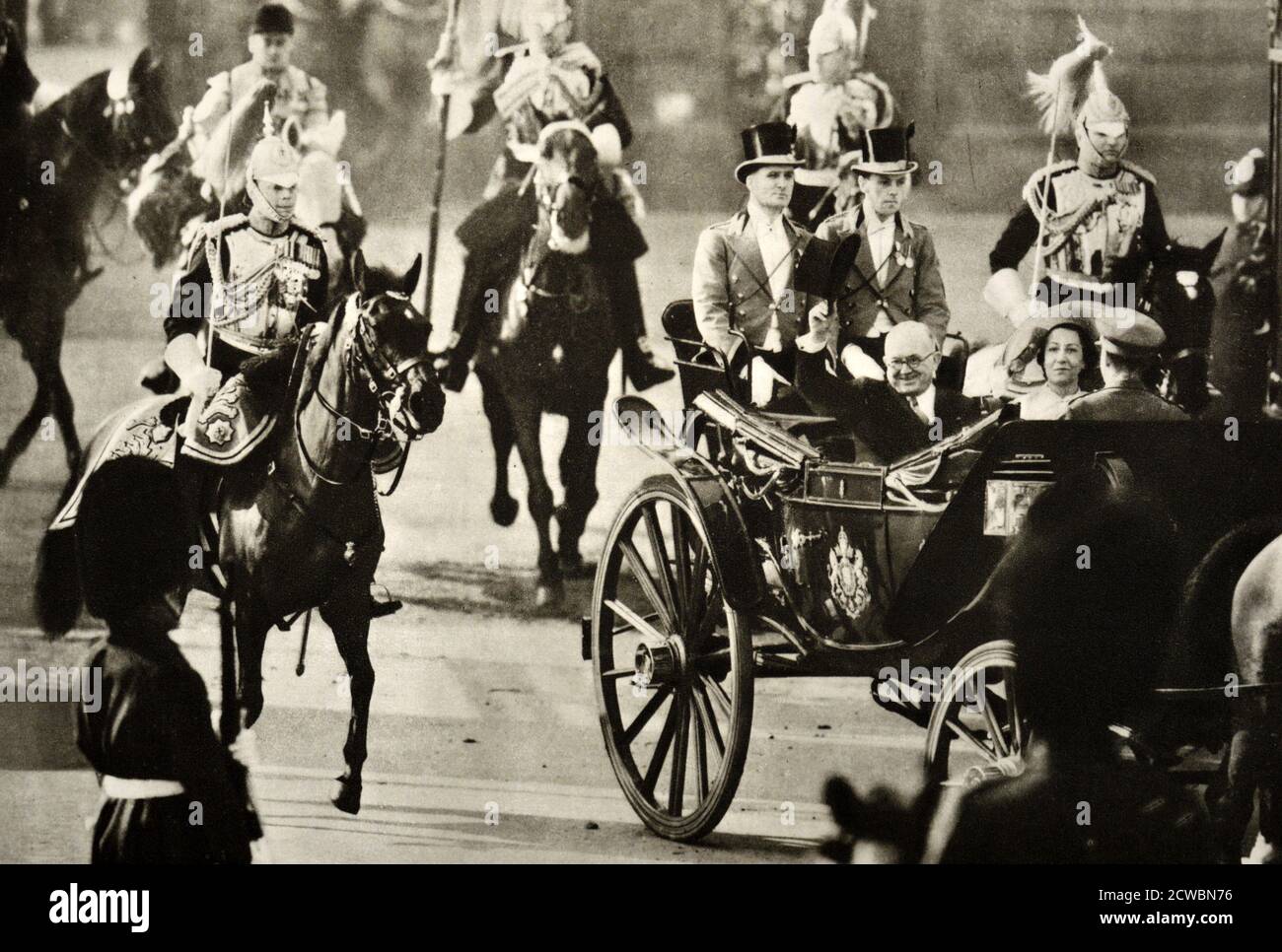 Black and white photograph French President Vincent Auriol (1884-1966) visiting the UK riding in a carriage in London. Stock Photo