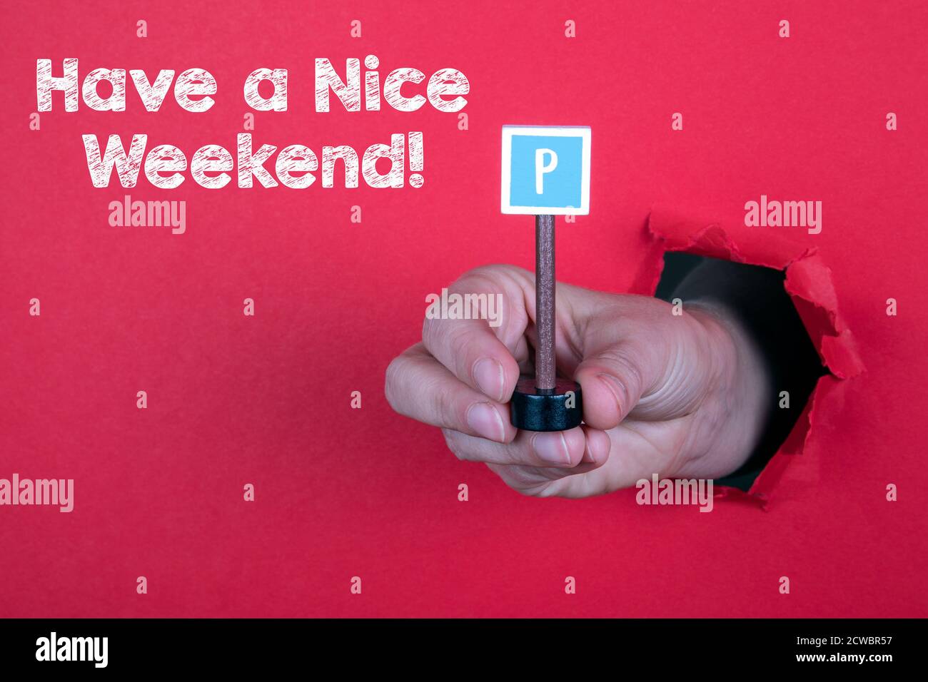 Have a Nice Weekend. Parking road sign in a woman's hand. Red ...