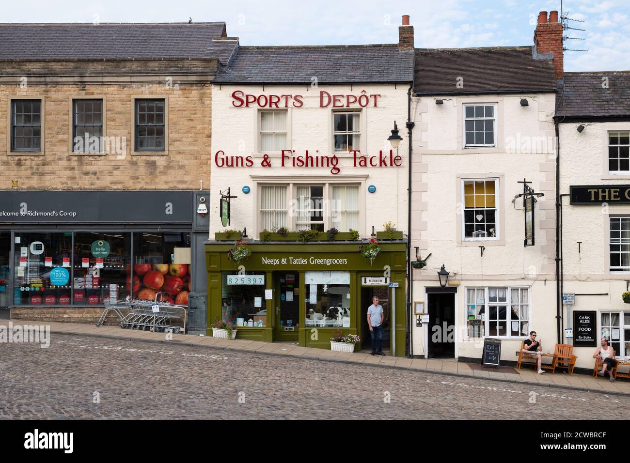 Richmond, North Yorkshire, England, UK - shops on Market place Stock Photo