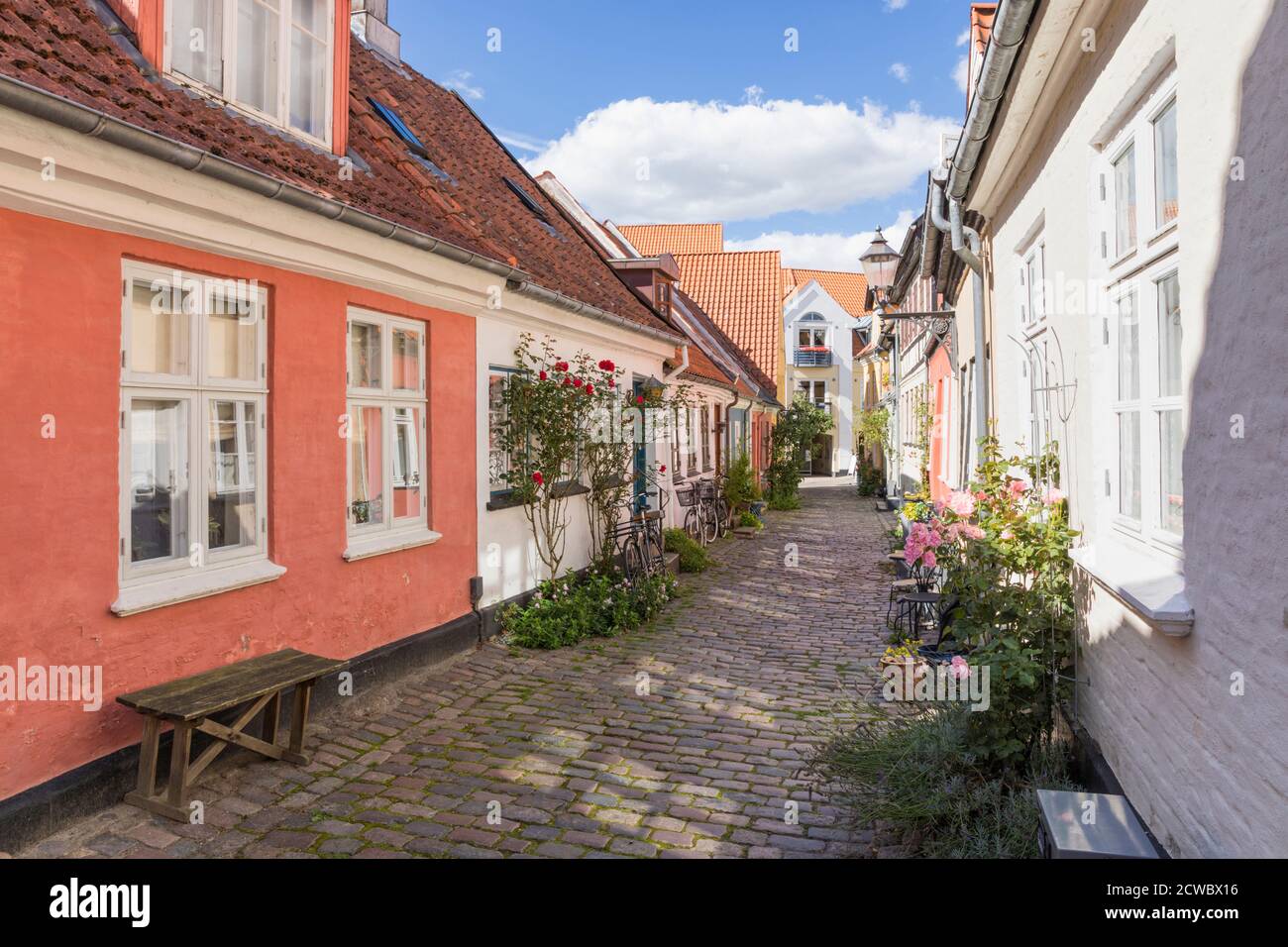 An idyllic cobbled street with colorful houses at the old town of