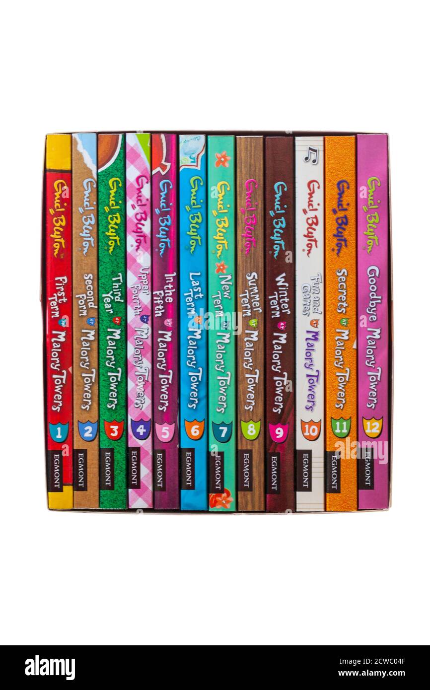 Complete Malory Towers Collection books by Enid Blyton isolated on white background - pile stack piled stacked Stock Photo