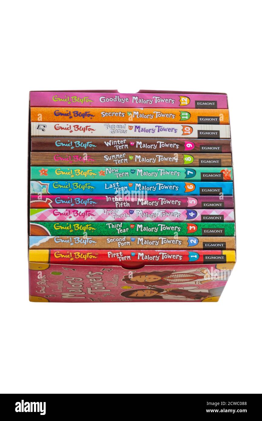 Complete Malory Towers Collection books by Enid Blyton isolated on white background - pile stack piled stacked Stock Photo