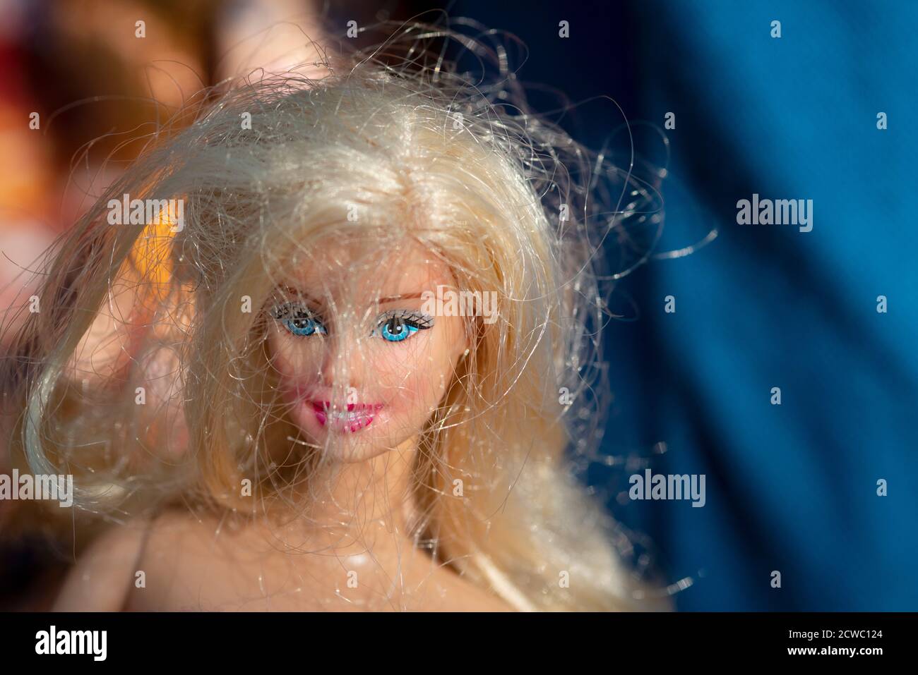Close-up of a Barbie Doll Face with Blonde Hair Stock Photo
